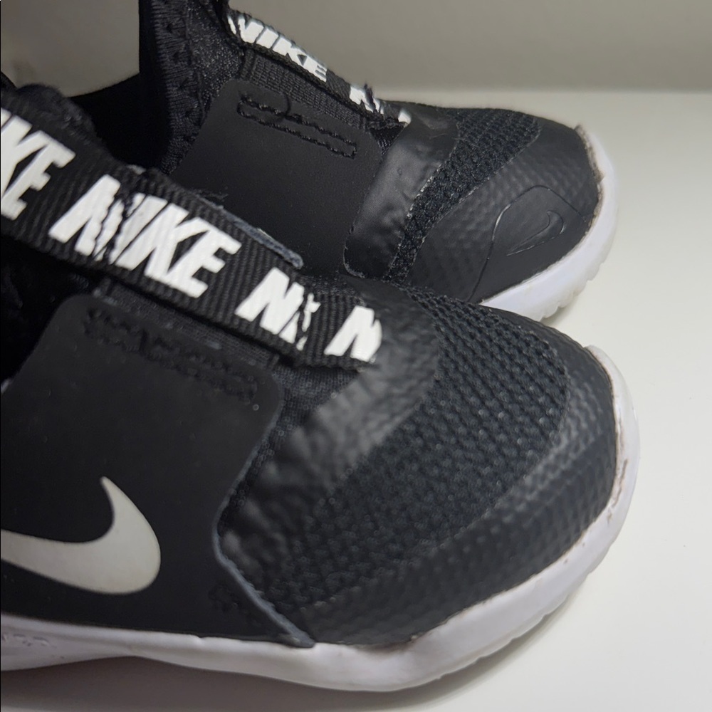 Nike Kids Black and White Slip-On Sneakers - Picture 2 of 11
